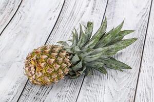 Sweet organic ripe tropical pineapple photo