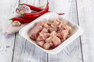 Raw uncooked chicken breast fillet photo