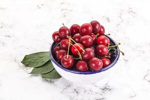 Ripe sweet juicy cherry heap photo