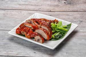 Asian cuisine - roasted duck with skin photo