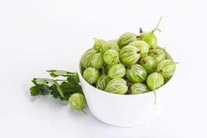 Sweet ripe gooseberries in the bowl photo