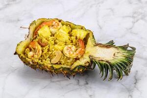 Thai cuisine - rice with prawn in pineapple photo