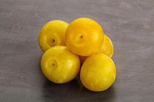 Yellow sweet plum heap fruit photo