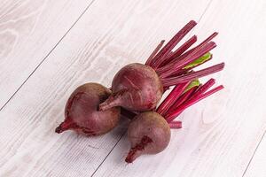 Young raw beetroot heap isolated photo