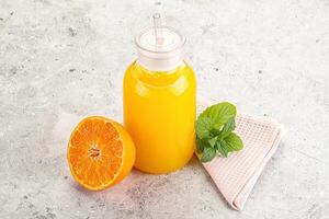 Fresh orange juice served mint photo
