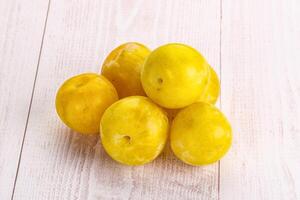 Yellow sweet plum heap fruit photo