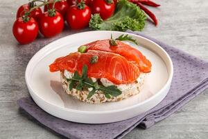 Crispy bread with salmon and cream cheese photo