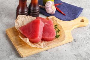 Delicous raw tuna steak for cooking photo