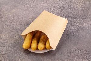 Breaded cheese sticks snack appetizer photo