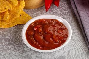 picante mexicano salsa salsa inmersión foto