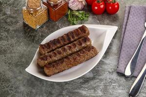 Grilled beef kebab minced meat photo