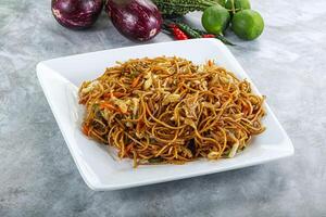 Stir fried noodles with vegetables photo