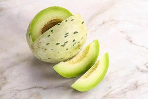 Ripe sweet and juicy dalmatian melon photo