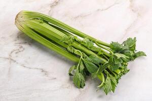 Vegan cuisine - celery stems with leaf photo