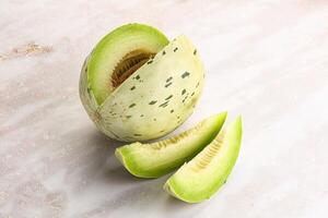 Ripe sweet and juicy dalmatian melon photo