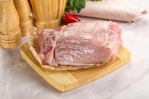 Raw uncooked pork meat loin photo