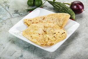 Indian tandori bread - naan with cheese photo