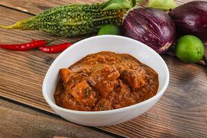 indio cocina - pollo condimento salsa foto
