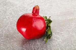 Ripe red sweet and juicy Pomegranate photo