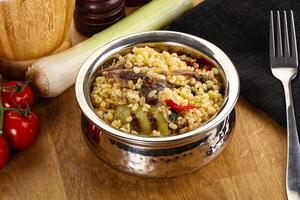 Bulgur with lamb and vegetables photo