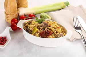 Bulgur with lamb and vegetables photo