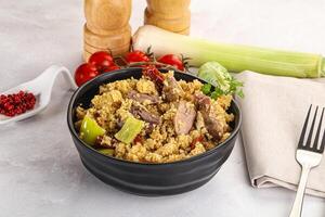 Bulgur with lamb and vegetables photo