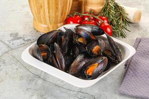 Tasty mussels in the bowl photo