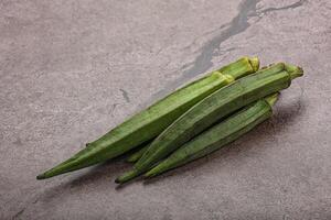 Green ripe tasty okra tropical vegetable photo