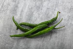 Hot and spicy green chili pepper photo