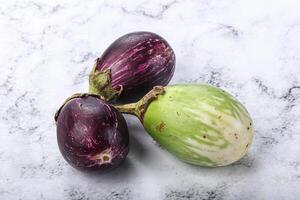 Heap of raw asian baby eggplant photo