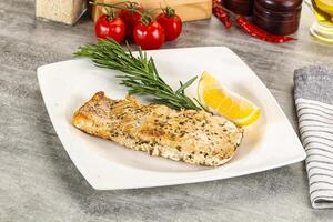 Baked salmon fish served rosemary photo