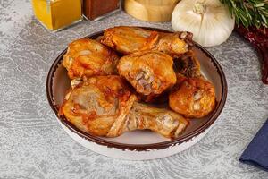 Raw marinated chicken drumstick for cooking photo