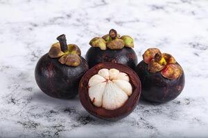 Sweet ripe juicy tropical Mangosteen photo