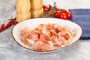 Spanish cured pork meat - Jamon photo