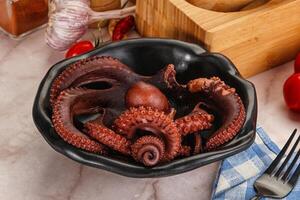 Boiled delicous Octopus in the bowl photo