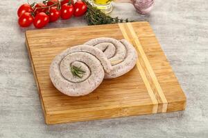 Natural spiral sausage for grill photo