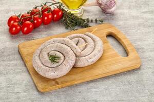 Natural spiral sausage for grill photo