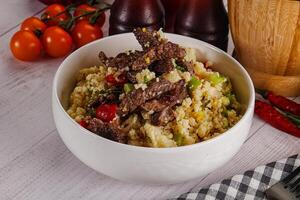 Traditional couscous with beef and vegetables photo