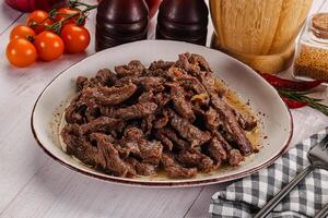 Stew beef slices with gravy photo