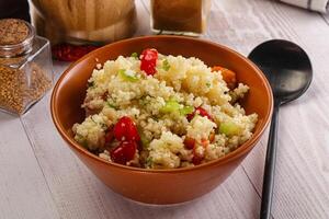 Vegan cuisine couscous with vegetables photo