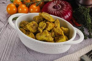 Indian cuisine curry chicken fillet photo