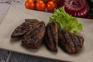 Grilled diet beef liver steak photo