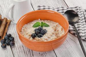 Oats porridge with blueberry photo