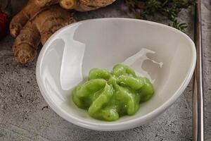 Green organic asian Wasabi seasoning photo