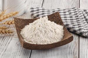 Wheat flour heap for bake photo