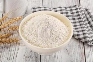 Wheat flour heap for bake photo