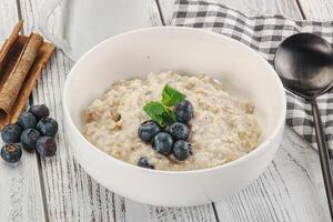 Oats porridge with blueberry photo