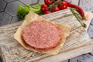 Raw beef uncooked burger cutlet photo