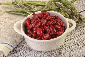 Baked red canned bean in the bowl photo