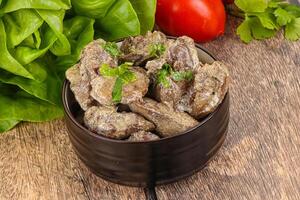 Chicken liver with cream sauce photo